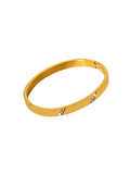 Raye - 18k gold plated stainless steel diagonal bangle